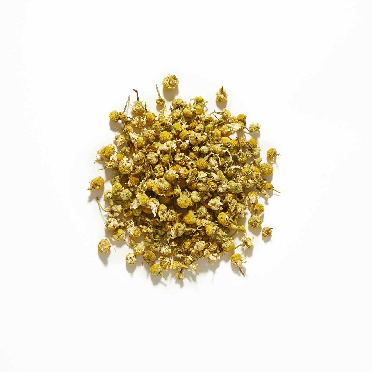 Whole Chamomile Blossoms Loose Leaf Tea arranged in a circle