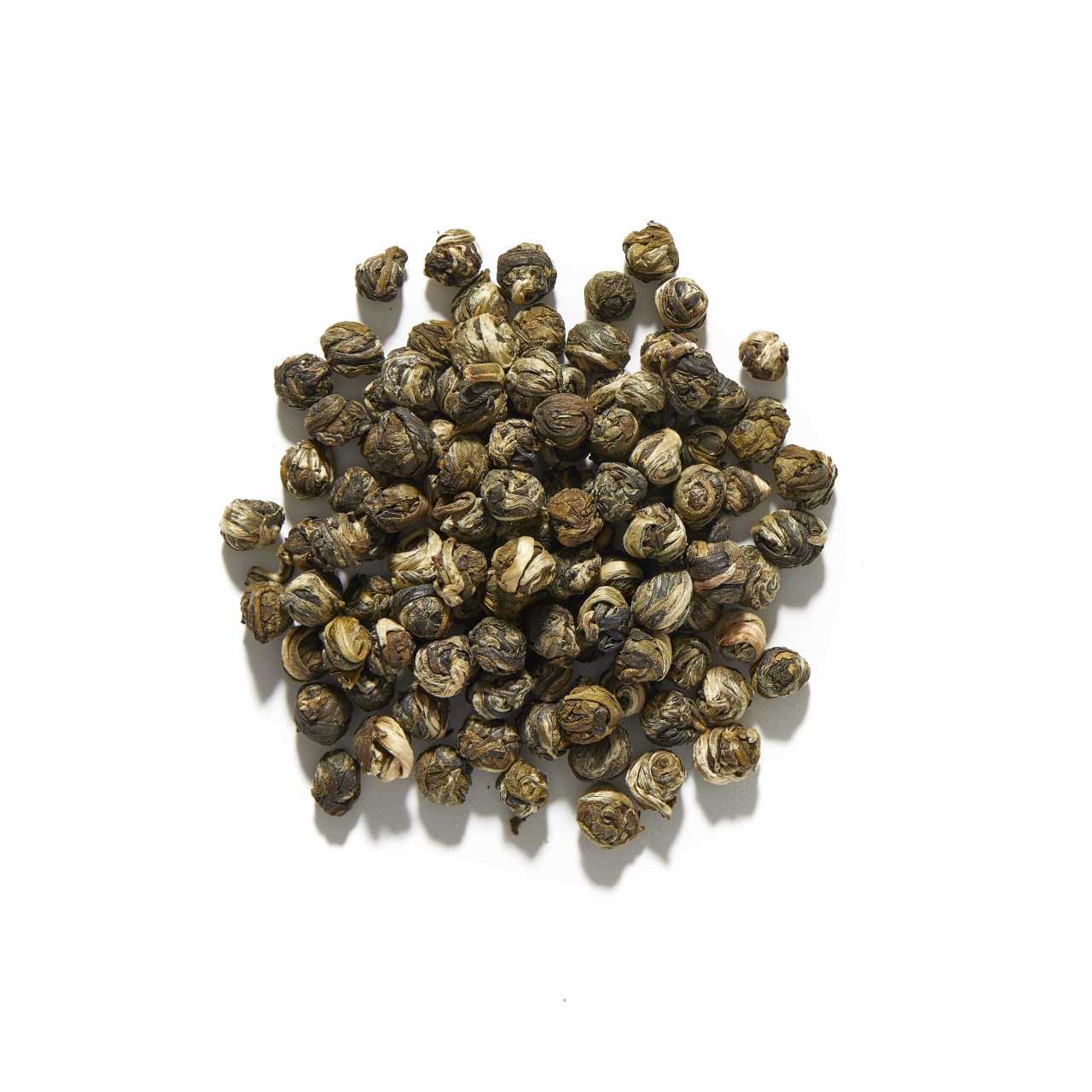 Jasmine Dragon Pearls Loose Leaf tea arranged in a circle