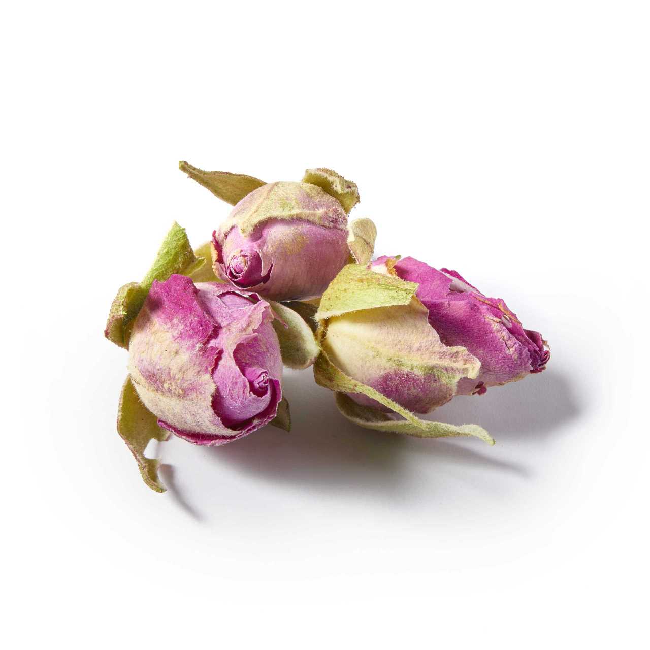 A macro pile of Whole Rose Buds Loose Leaf Tea