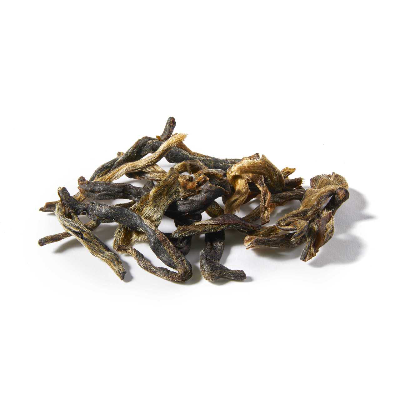 A macro pile of Raw Pu-Erh Cake  Loose Leaf Tea